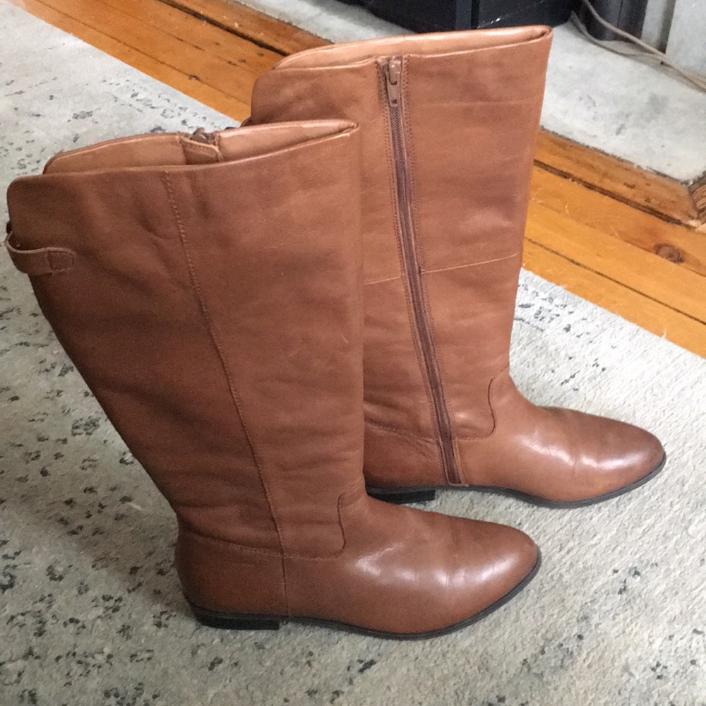 Tall brown leather boots